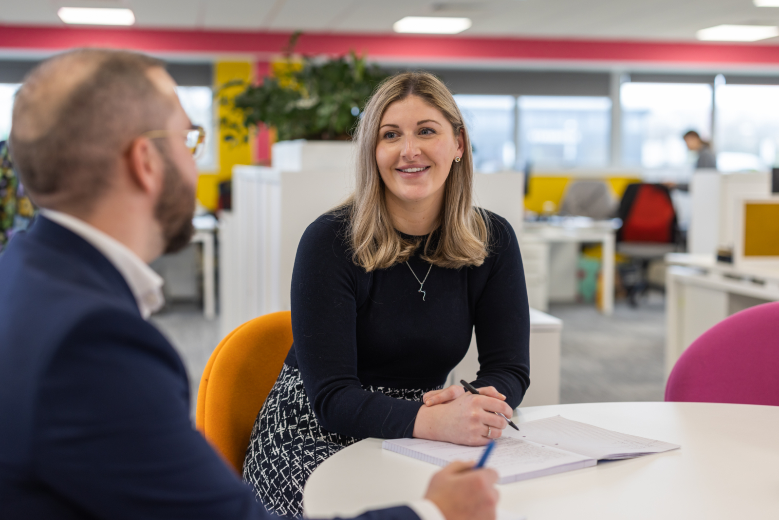 A male and female lawyer having a meeting