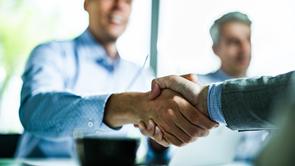 Two men shaking hands